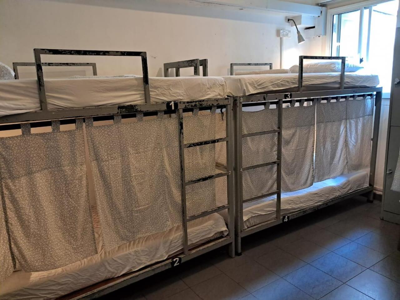 Single Bed in Dormitory Room